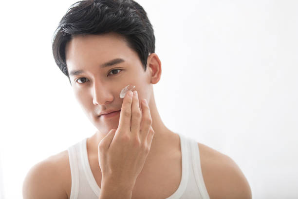 Man using facial cleanser instead of soap.