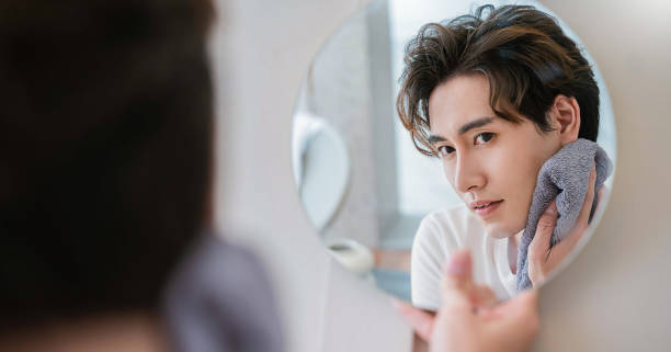 handsome, asian boy with skincare routine